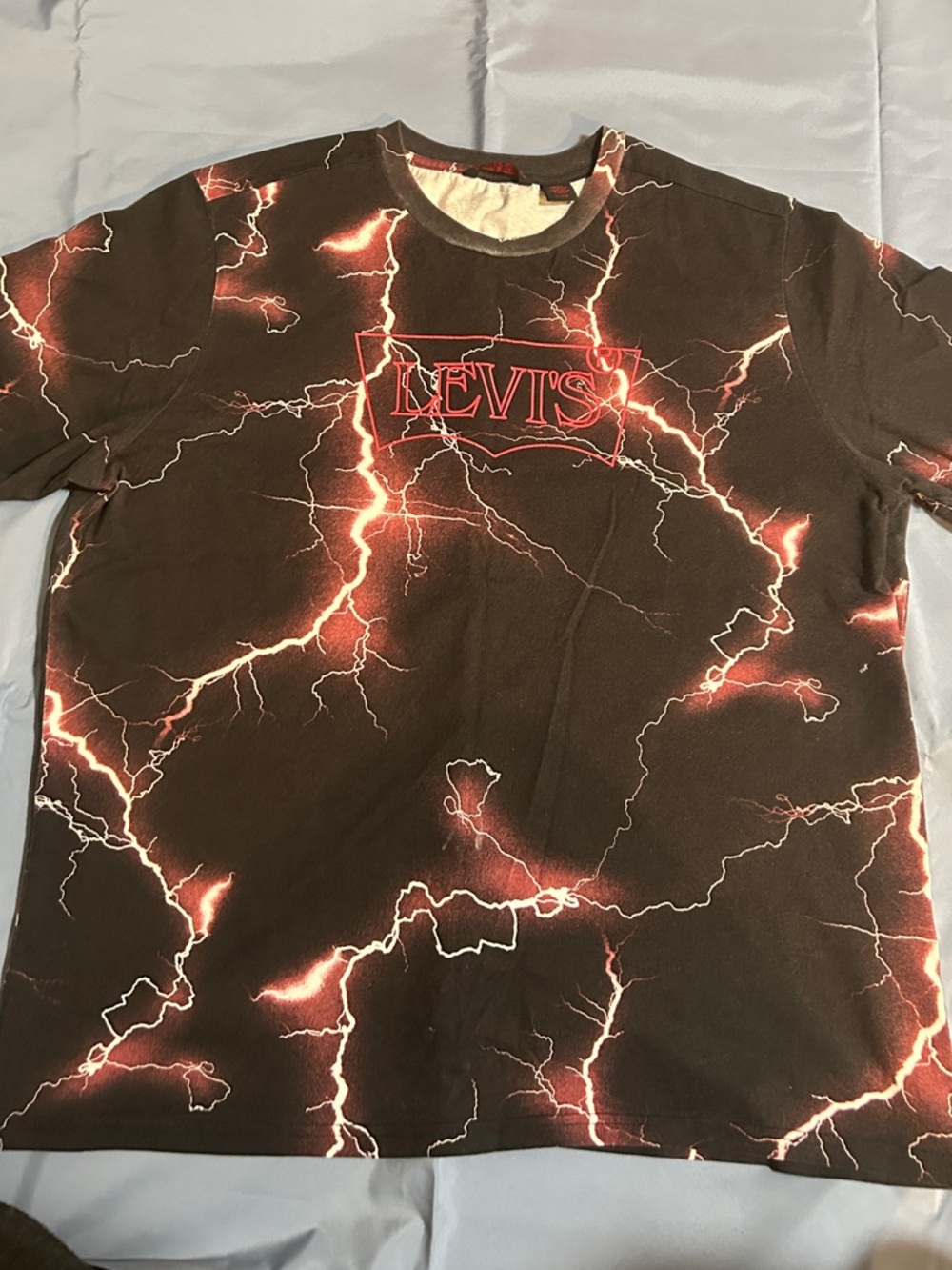 Levi's Black Tee with Red and White Lightning Graphic
